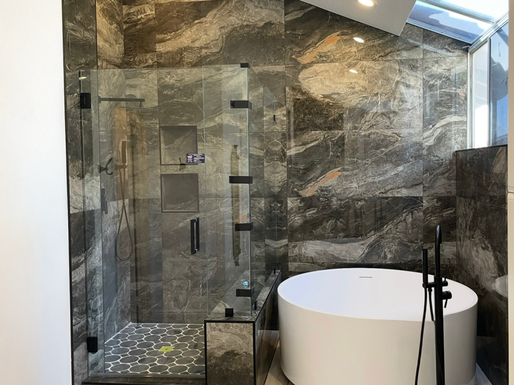 Spa-style bathroom renovation with freestanding tub – alfaremodel.com